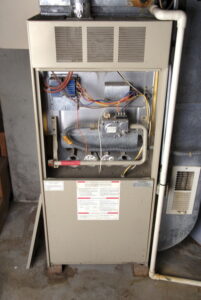 furnace-with-front-panel-open-for-maintenance