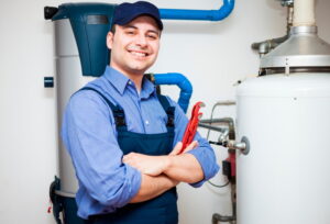 plumber-with-wrench-and-water-heater